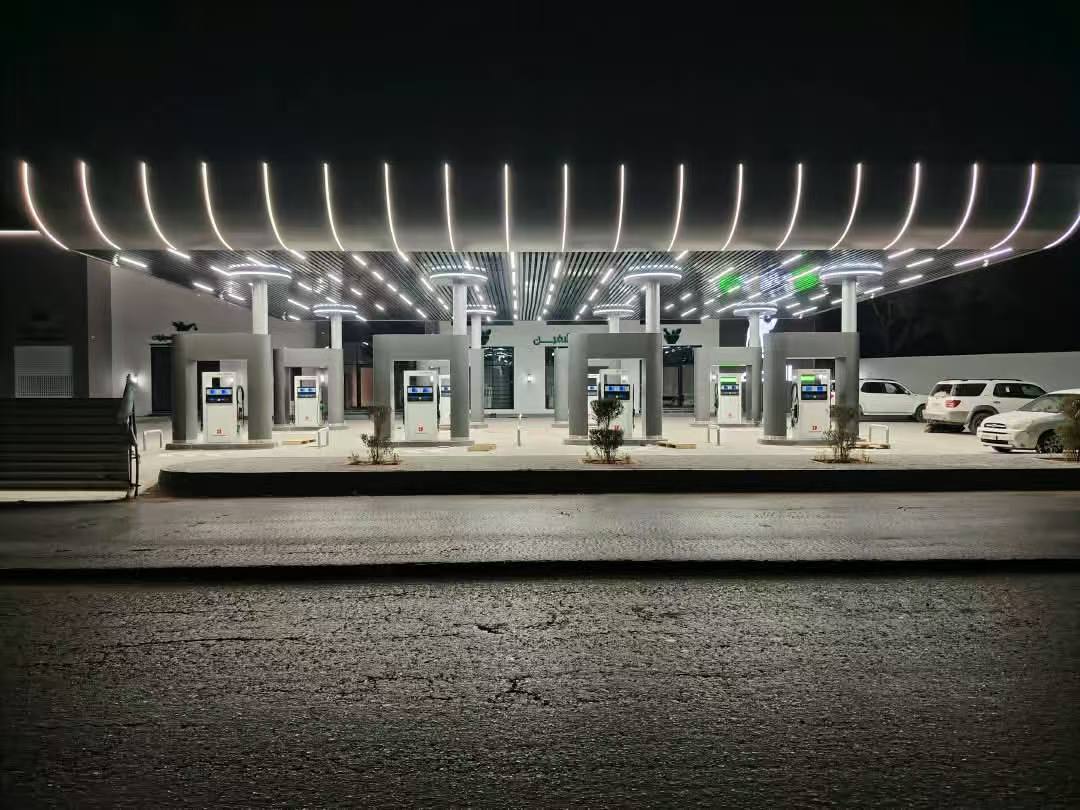 Night view of a new station with canopy strip lighting